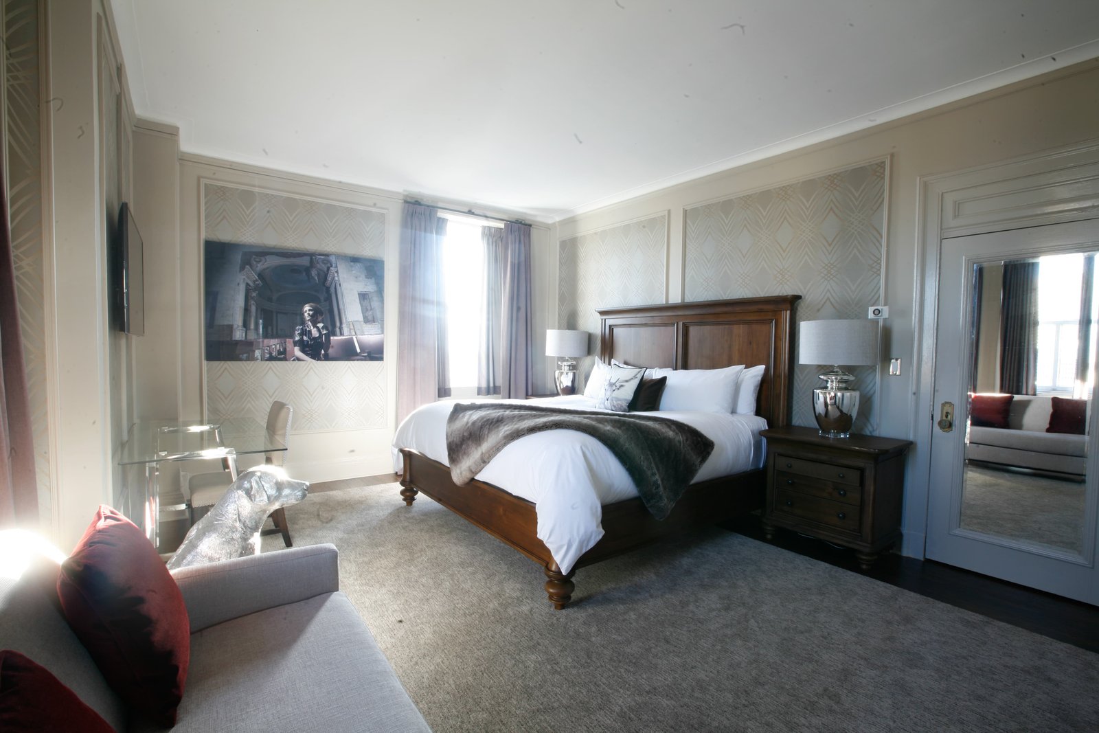Fort Garry Hotel master suite interior design — walnut headboard bedroom